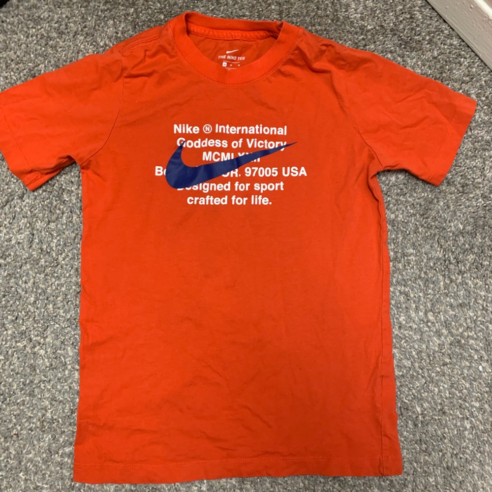 orange nike shirt